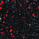 Illustration for article titled The Cosmic War Between Ancient Starburst Galaxies And Supermassive Black Holes